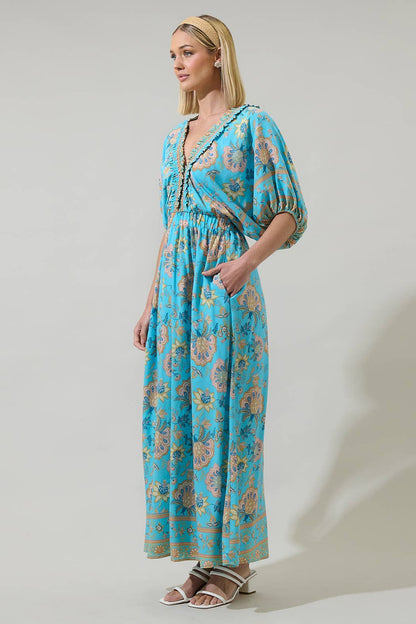 Raven Floral Hant V-Neck Midi Dress: blue floral, ruffled neckline, puff sleeves, side pockets. Sizes XS-XL.