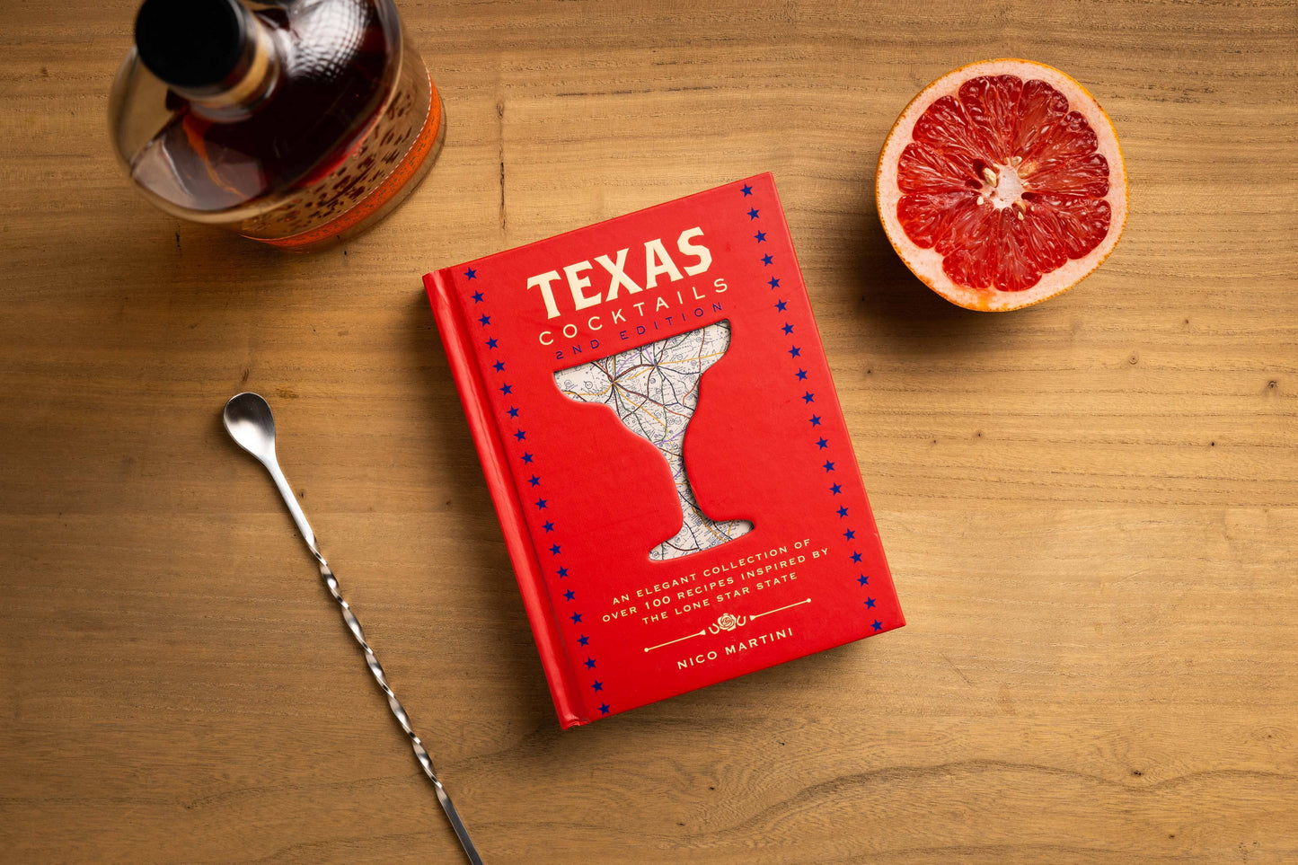 Texas Cocktails (Second Edition)" recipe book with a red cover. Size options unavailable.
