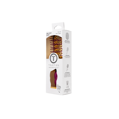 Mini Vented Hair Brush - Mulberry in a white box with clear window, compact size, purple and pink handle and bristles. Available in mini size. Product details on box side.