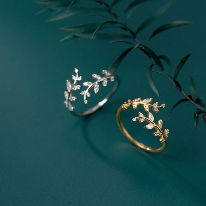 Gold Olive Tree Leaf Branch Band Ring in 925 Sterling Silver, gold or silver finish, delicate leaf motif; available in multiple sizes.