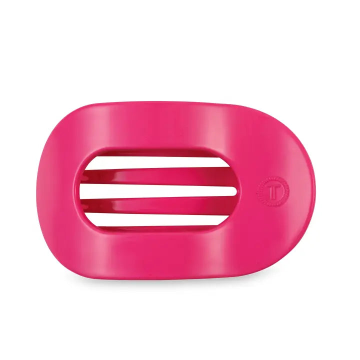 Bright pink oval soap dish with three center slats and a small embossed logo on the right. Available in multiple sizes.