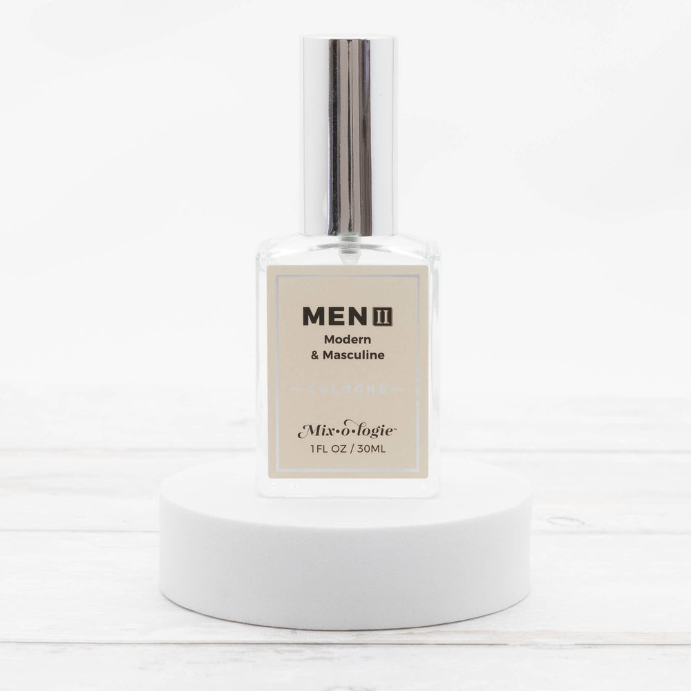 Men’s II (Modern & Masculine) Cologne Spray in a clear glass 30 mL bottle with shiny silver cap. Available in 30 mL size.