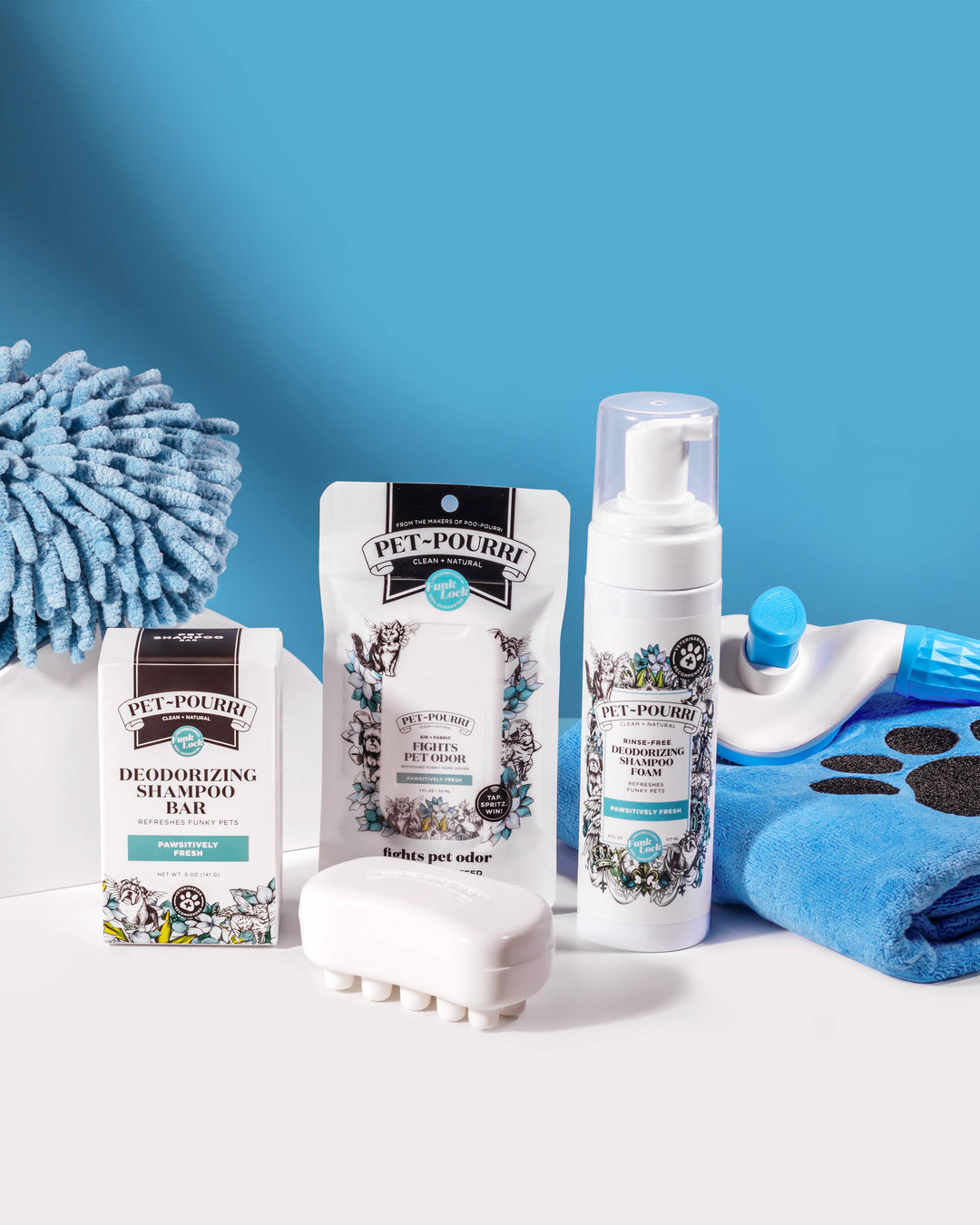 Pet~Pourri Pawsitively Fresh Rinse-Free Deodorizing Shampoo available in multiple sizes.