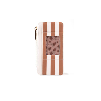 Vertical vegan leather wallet with brown and white stripes, gold zipper on the left, and clear ID window showing a card with pink and brown heart pattern. Available in one size.