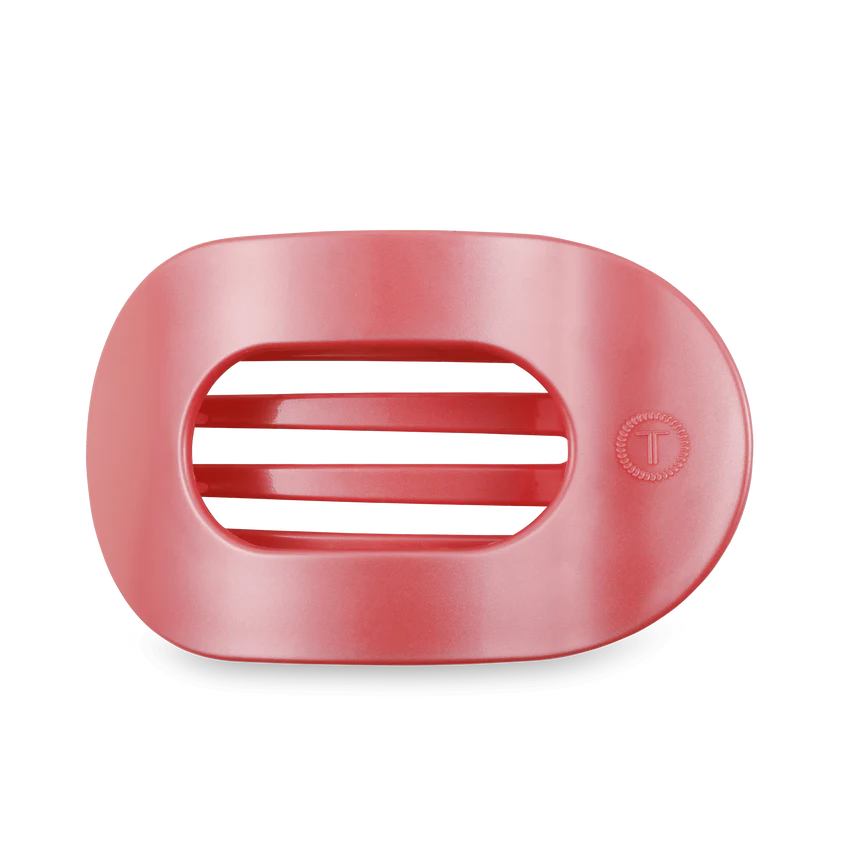 The TELETIES Flat Round Hair Clip is pink with a rounded rectangular shape and open slats. Available in one size.