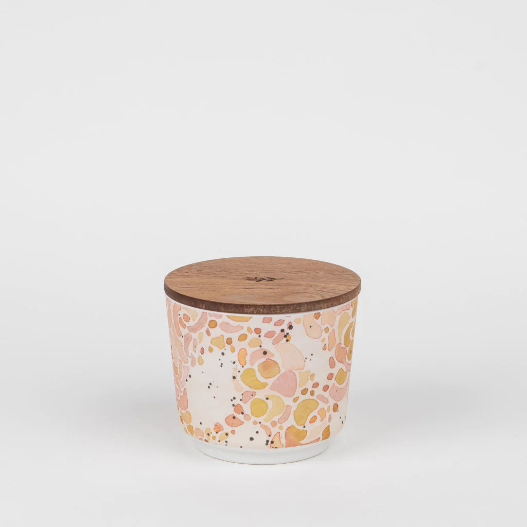 The Cashmere Kiss 3-Wick Candle (GLG925522) in a speckled ceramic jar with wooden lid. Size options not shown.
