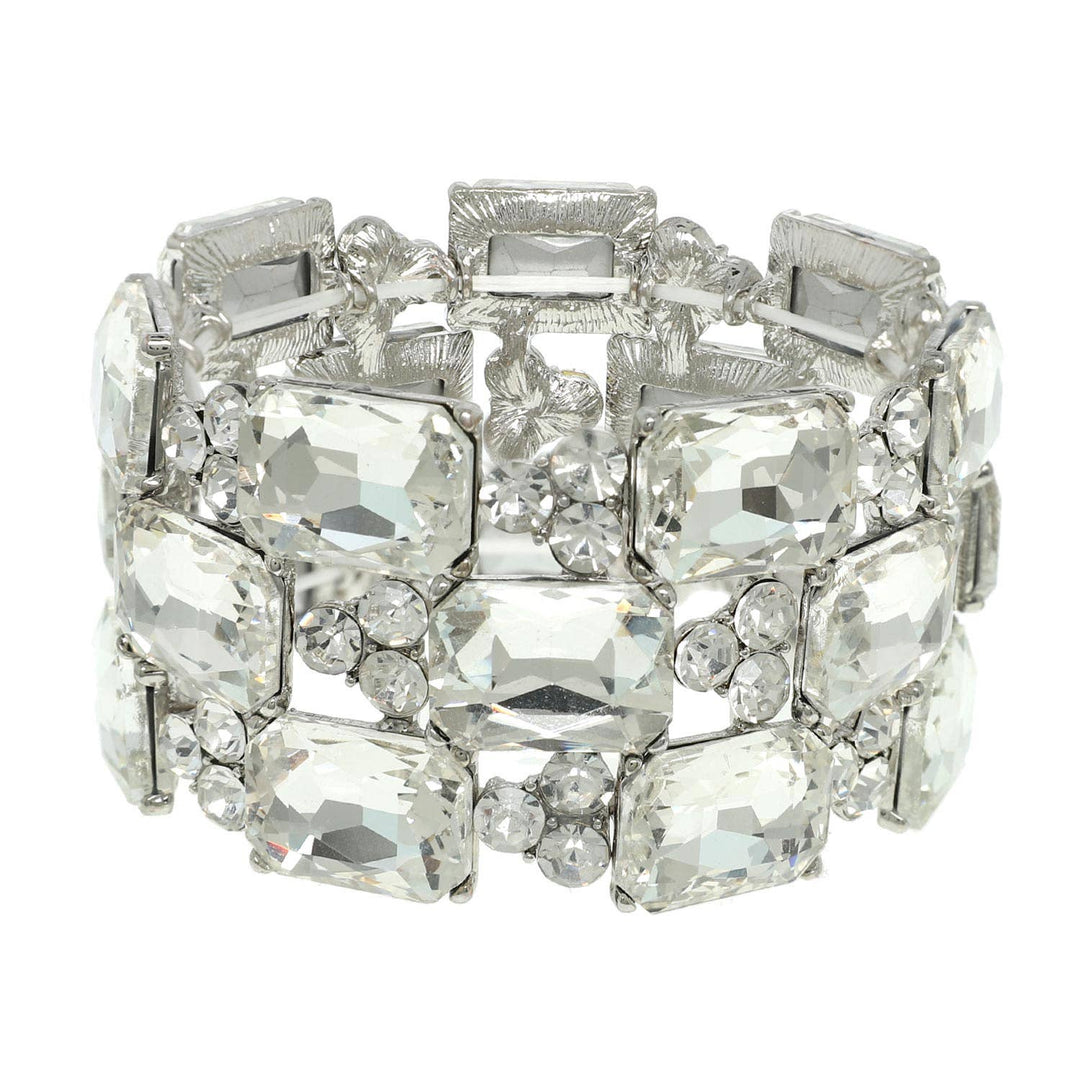 Silver 3-row bracelet with large rectangular and small round clear crystals, in overlapping pattern. Sizes: S, M, L.