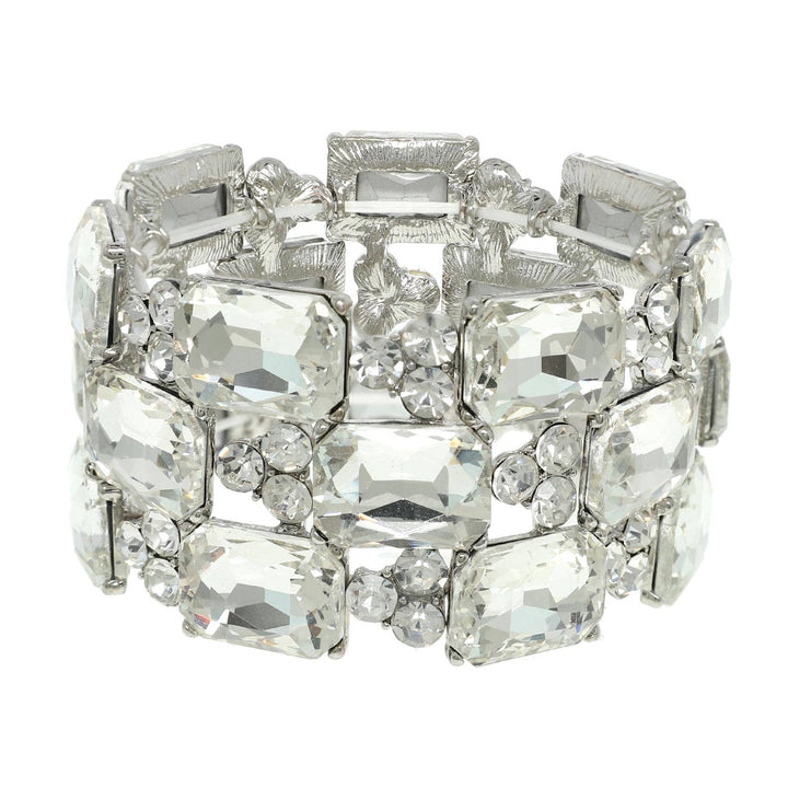 Silver 3-row bracelet with large rectangular and small round clear crystals, in overlapping pattern. Sizes: S, M, L.