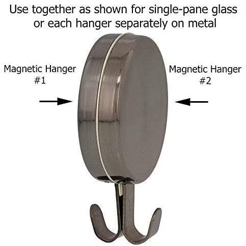 Two green Attract® Magnetic Hanger, 2 Pack.