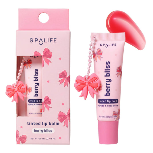 Spalife’s Berry Bliss Tinted Lip Balm with peptide and shea butter comes in a pink tube, includes a matching box, and a swatch showing the balm’s pink shade. Packaging and keychain feature pink bows. Available sizes not specified.