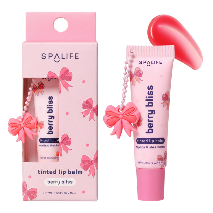 Spalife’s Berry Bliss Tinted Lip Balm with peptide and shea butter comes in a pink tube, includes a matching box, and a swatch showing the balm’s pink shade. Packaging and keychain feature pink bows. Available sizes not specified.