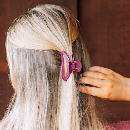 Open Mulberry Small Hair Clip securing hair; available in small size.
