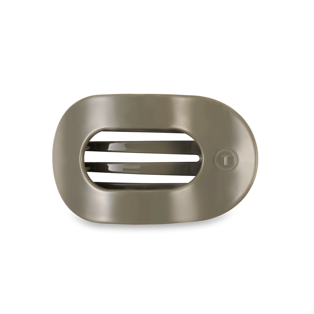 Oval taupe soap dish with three horizontal drainage slats and a small right-side circle. Available in multiple sizes.
