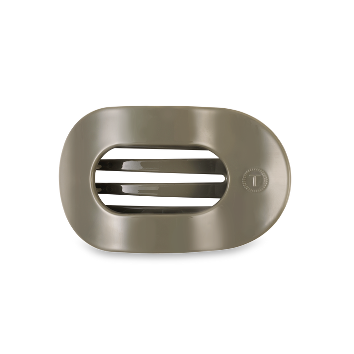Oval taupe soap dish with three horizontal drainage slats and a small right-side circle. Available in multiple sizes.