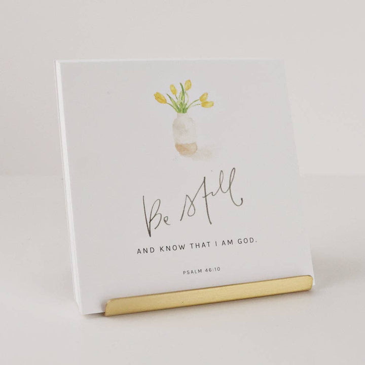 White square plaque with watercolor vase of yellow flowers and "Be Still and know...Psalm 46:10" text. Sizes: 4"x4", 6"x6".