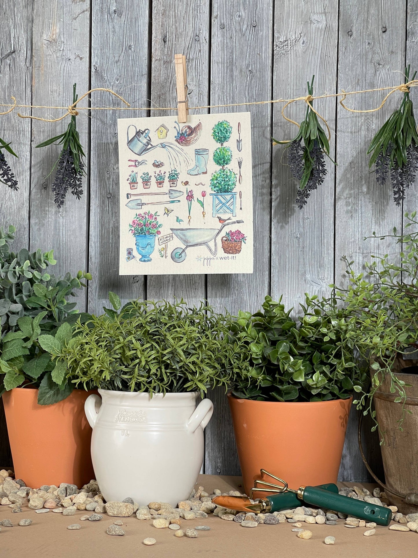 English Cottage Garden Swedish Cloth with garden-themed illustration; available in 6"x8" and 8"x10".