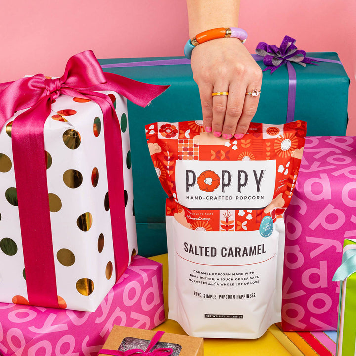 Bag of Salted Caramel Popcorn, available in 100g and 250g sizes.