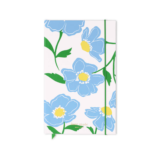 Large notebook with white cover, blue/yellow flowers, green stems, lined pages, green elastic. Sizes available: Large.