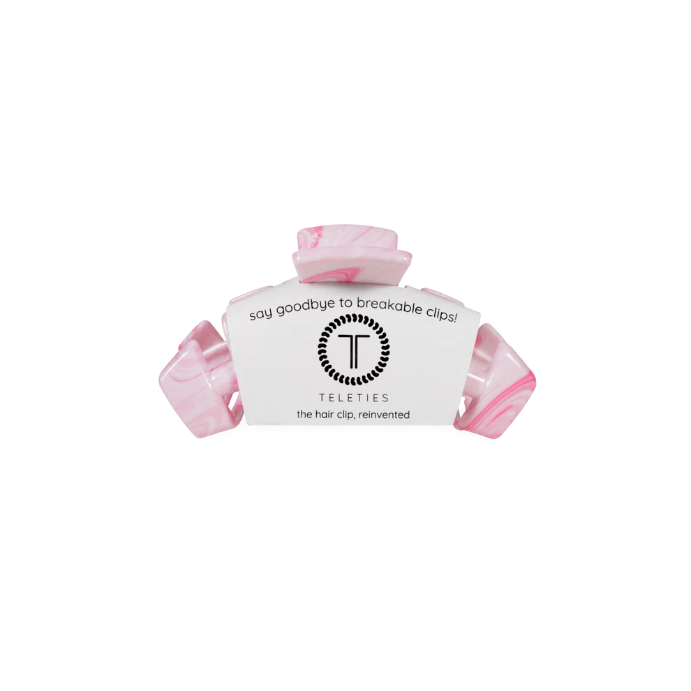 Pink marbled Classic Tiny Claw Clip with white label. Available sizes: tiny. Text: "say goodbye to breakable clips!.