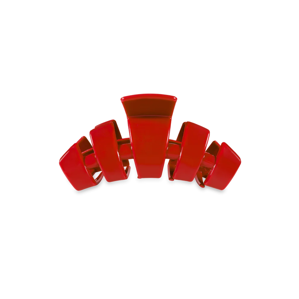 Red plastic Tiny Claw Clip with wide, curved prongs. Available in small sizes. Durable for everyday hair styling.