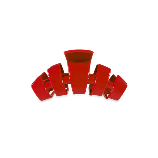 Red plastic Tiny Claw Clip with wide, curved prongs. Available in small sizes. Durable for everyday hair styling.