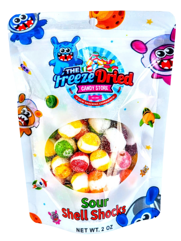 4 oz bag of Freeze Dried Shell Shocks: Sour Wild Berry, colorful packaging with cartoon monsters, crunchy fruity candy snacks.