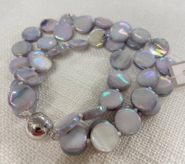 Mother of Pearl Bracelet with iridescent round design and stainless magnet clasp. Available in S, M, L.