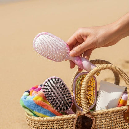Mini Detangler Brush | Medium | Pinch Me! shown in hand; available in medium size.