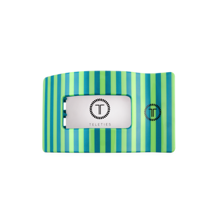 The Cabana Cutie Flat Rectangle Hair Clip is a medium-sized, rectangular hair clip with teal and green vertical stripes, a cut-out center, and the TELETIES logo in black on white.