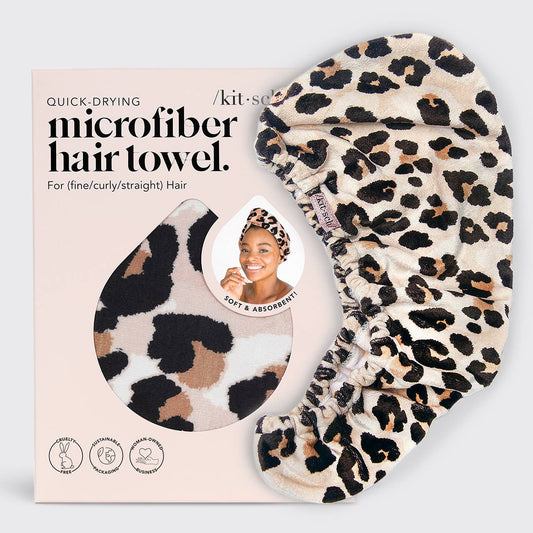 Quick Dry Hair Towel - Leopard print beside its box; packaging shows pattern cutout. Absorbent, reduces frizz. Sizes: S/M/L.