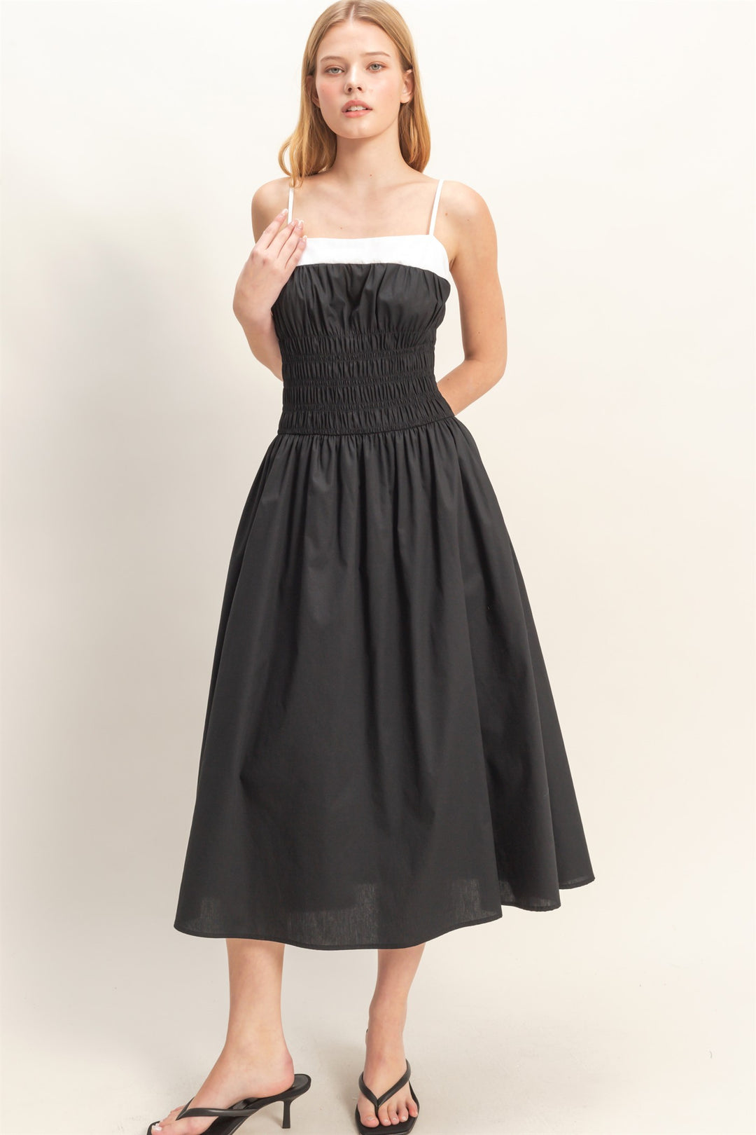 Black Smocked Strapped Midi Dress with white neckline, thin straps. Sizes: XS-XL.