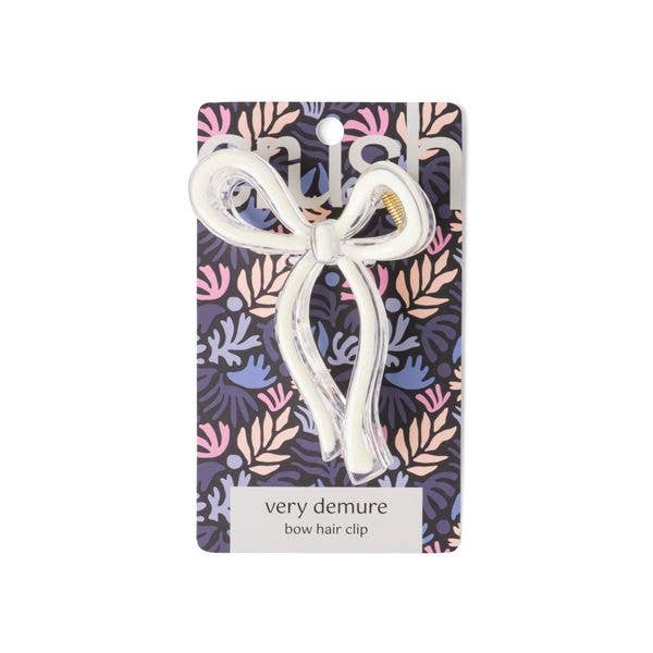 White Crush Very Demure Bow Hair Clip; available in multiple sizes. Simple, elegant design for easy styling.