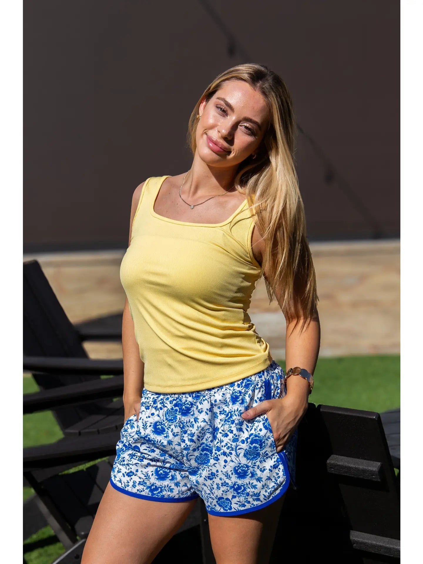 Blue Floral Go-Getter Shorts in available sizes XS-XL, featuring a vibrant pattern and practical pockets.