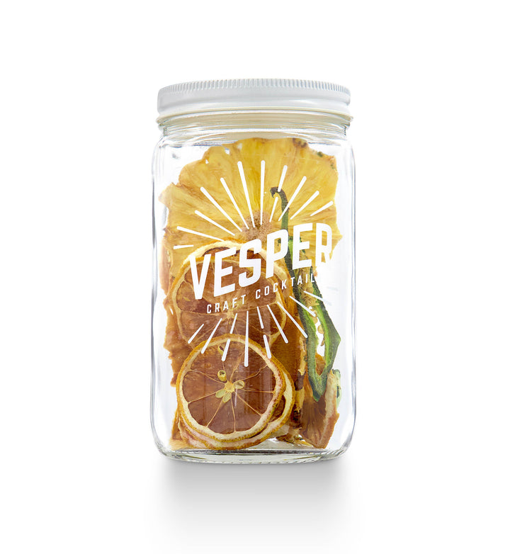 32 oz clear glass jar with white lid, labeled for Craft Cocktail Kit - Jalapeño Margarita. Contains dried citrus slices.
