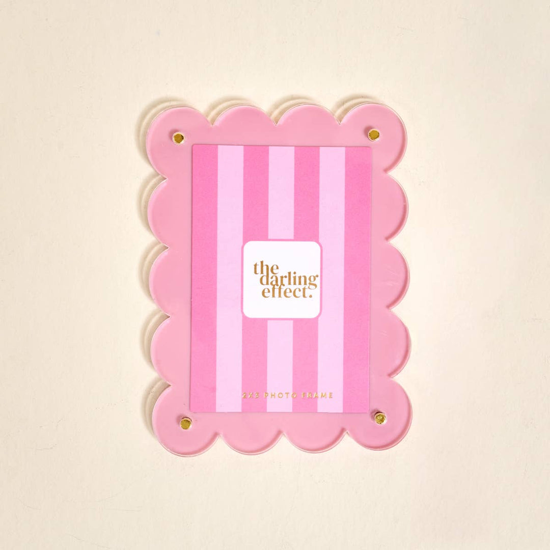 Mini Acrylic Picture Frame Magnet–Blush: pink scalloped edges, gold “the darling effect” text. Size: mini.
