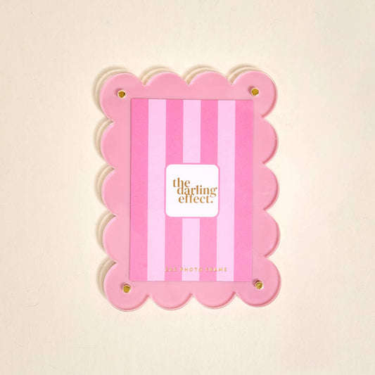 Mini Acrylic Picture Frame Magnet–Blush: pink scalloped edges, gold “the darling effect” text. Size: mini.