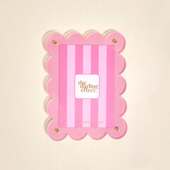 Mini Acrylic Picture Frame Magnet–Blush: pink scalloped edges, gold “the darling effect” text. Size: mini.