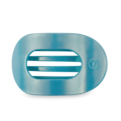 Translucent blue plastic soap dish with two horizontal drainage slots. Available in small and large sizes.