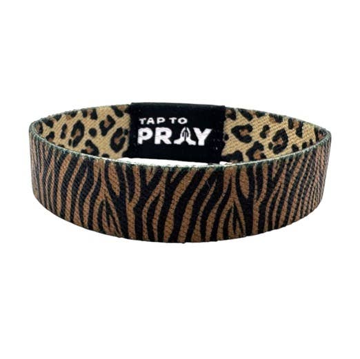 Brown and black leopard print wristband with "TAP TO PRAY" in white; available in multiple sizes.