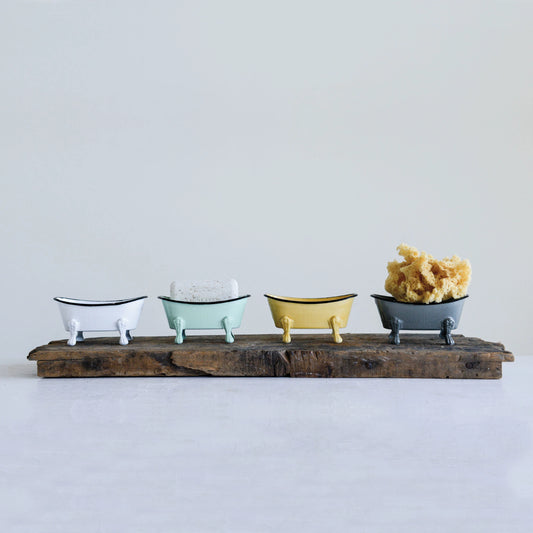 Four small, vintage-style Metal Bathtub Soap Dishes on a rustic wooden plank. Colors: white, mint green, yellow, and blue-gray. Size: small.