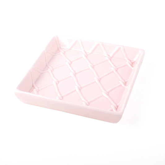 Square light pink ceramic napkin tray with crisscross diamond texture. Available sizes: 6x6 in.
