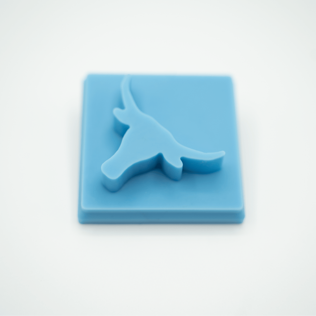 Blue, square cocktail inserts with raised longhorn skull design, available in 3-pack. Sizes available.