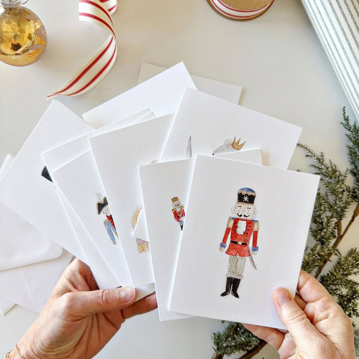 Nutcracker assorted notecard set featuring festive illustrations including a nutcracker; available in standard notecard sizes.