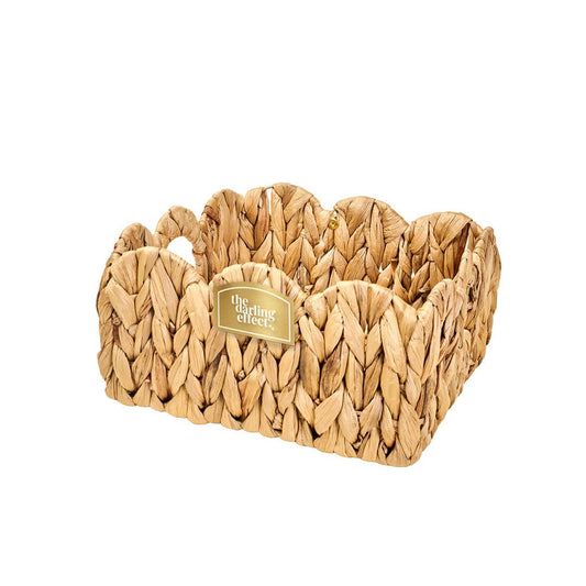 Medium Scalloped Wicker Basket with natural braided fibers, scalloped edges, and "The Stirling Effect" label. Sizes: Medium.