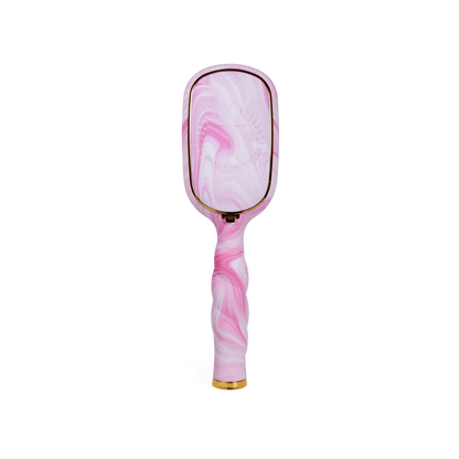 Rectangular pink and white marbled detangler brush with gold-trimmed head and matching handle. Sizes: standard.
