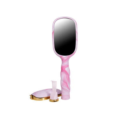 Pinch Me! Tie Dye Pink Detangler Hair Brush with gold details shown; available in standard and mini sizes.