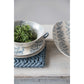 Stacked ceramic bowls with blue patterns. Sizes: Small, Medium, Large.