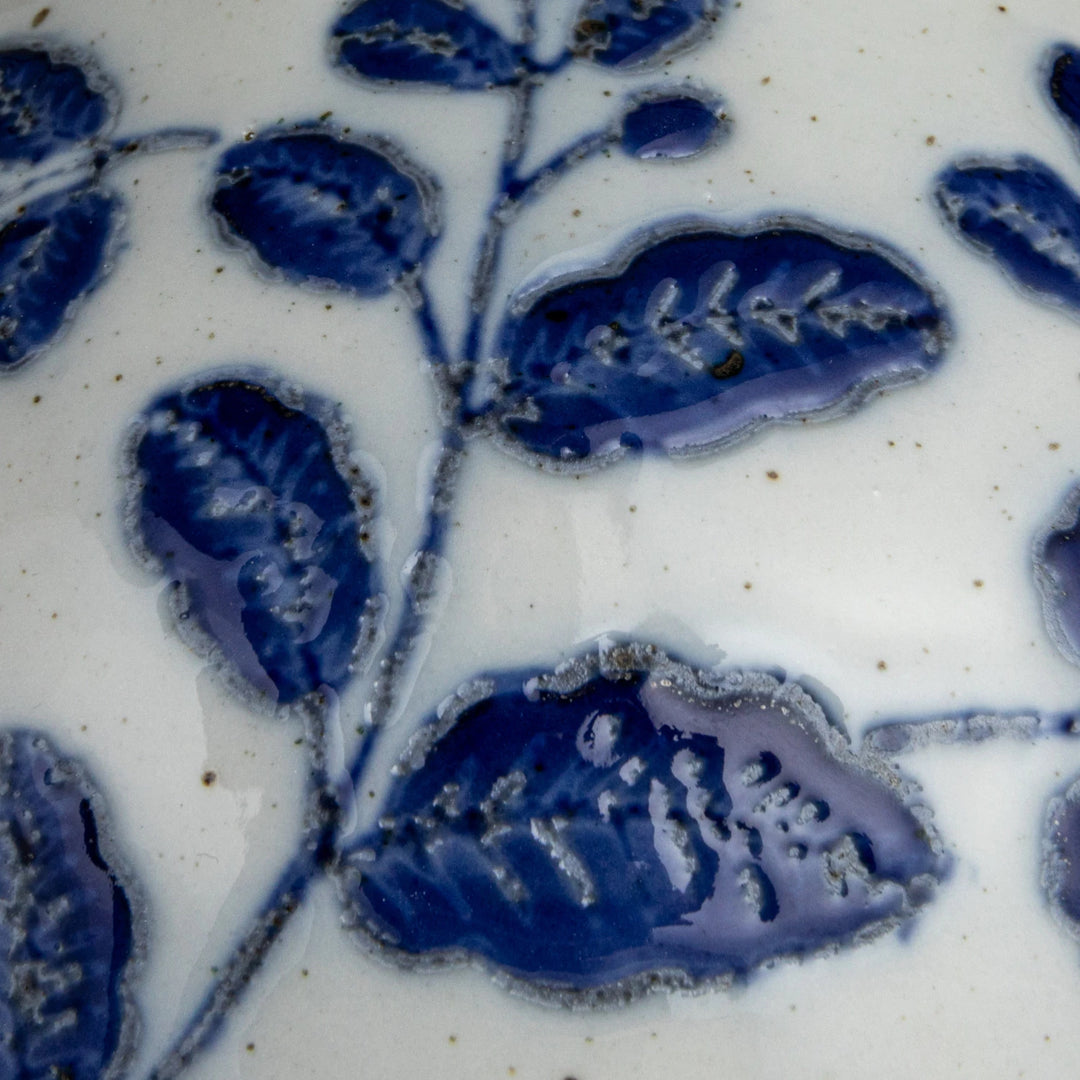 Blue &amp; white hand-painted stoneware vase with embossed leaf pattern, textured details, and slight speckling. Sizes: S, M, L.