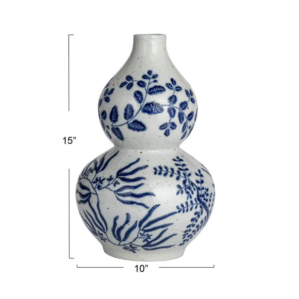 Hand-painted blue floral and leaf designs on white stoneware vase, double-gourd shape, 15"H x 10"W.
