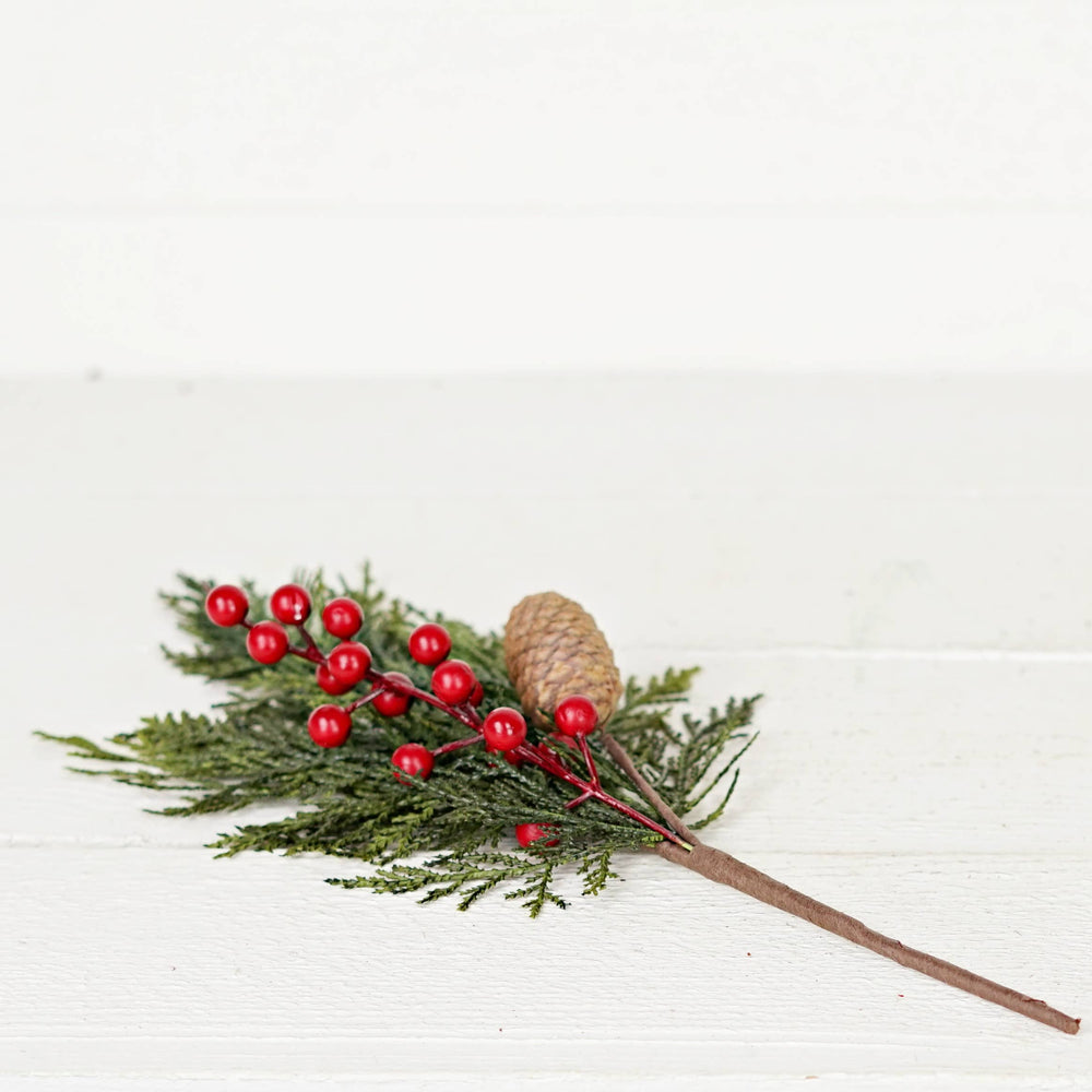 Superior Real Touch Mix Cedar Red Berry: green pine needles, red berries, and a small pine cone. Available in 12-inch and 18-inch sizes.